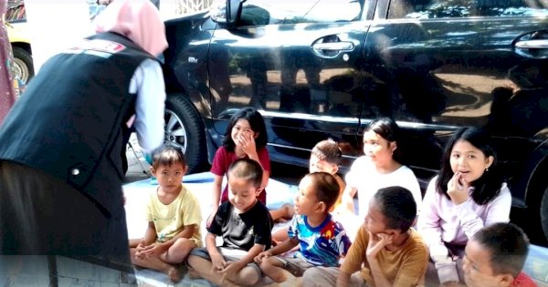 Dongkel Dinas Perpustakaan Hibur Anak-Anak di Posyandu Nusa Indah Empat Tallo
